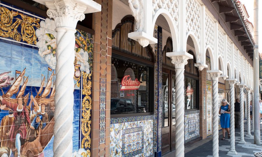 Tiled columns and the arcade of the Columbia Restaurant on 7th Avenue in Ybor City, Tampa