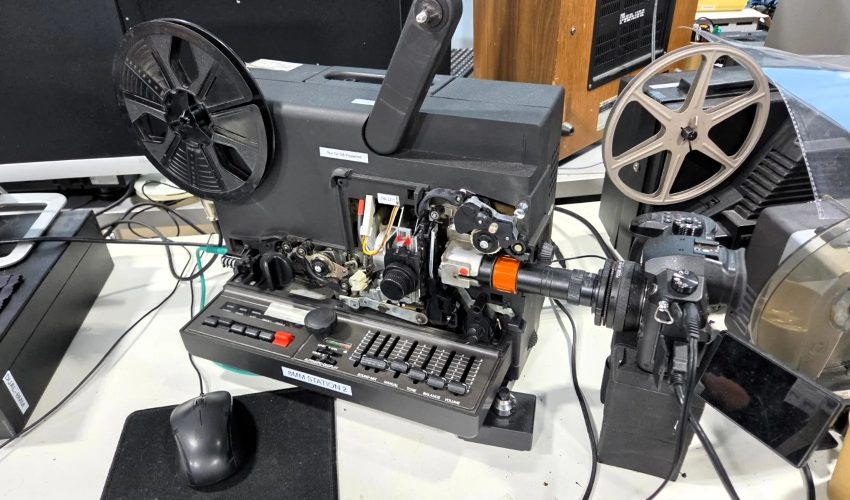 Telecine machine converting 8mm film reels to digital video