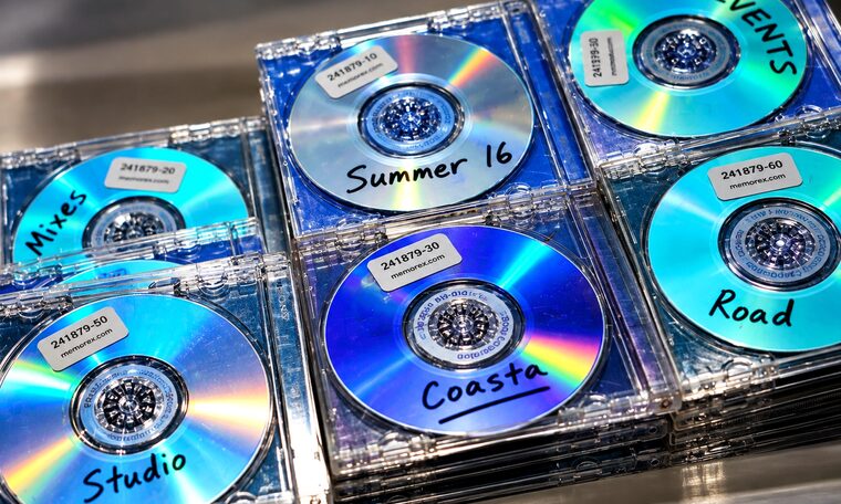 Labelled home burned discs stacked at the Forever Studios disc bench