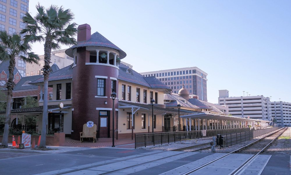 The old Orlando railroad depot at Church Street Station, a brick and timber building with a corner tower