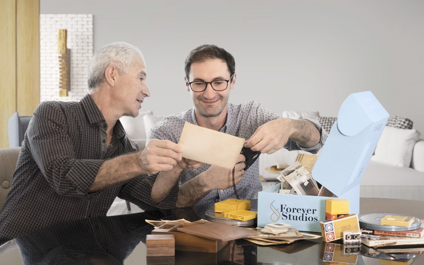 Father and son rediscovering family memories with Forever Studios shipping kit