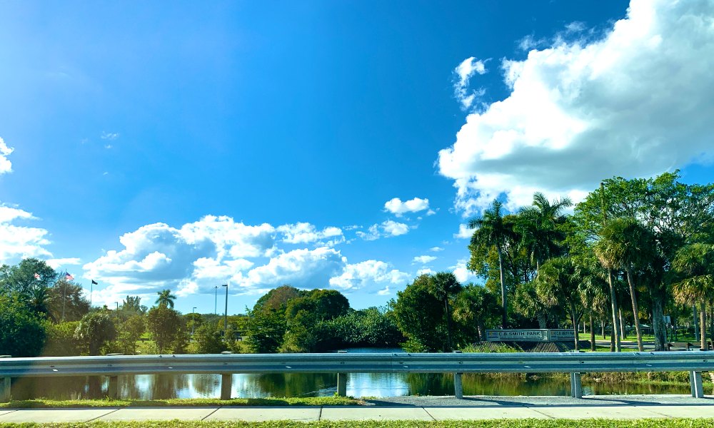 A lake and picnic grounds at C.B. Smith Park in Pembroke Pines, Florida