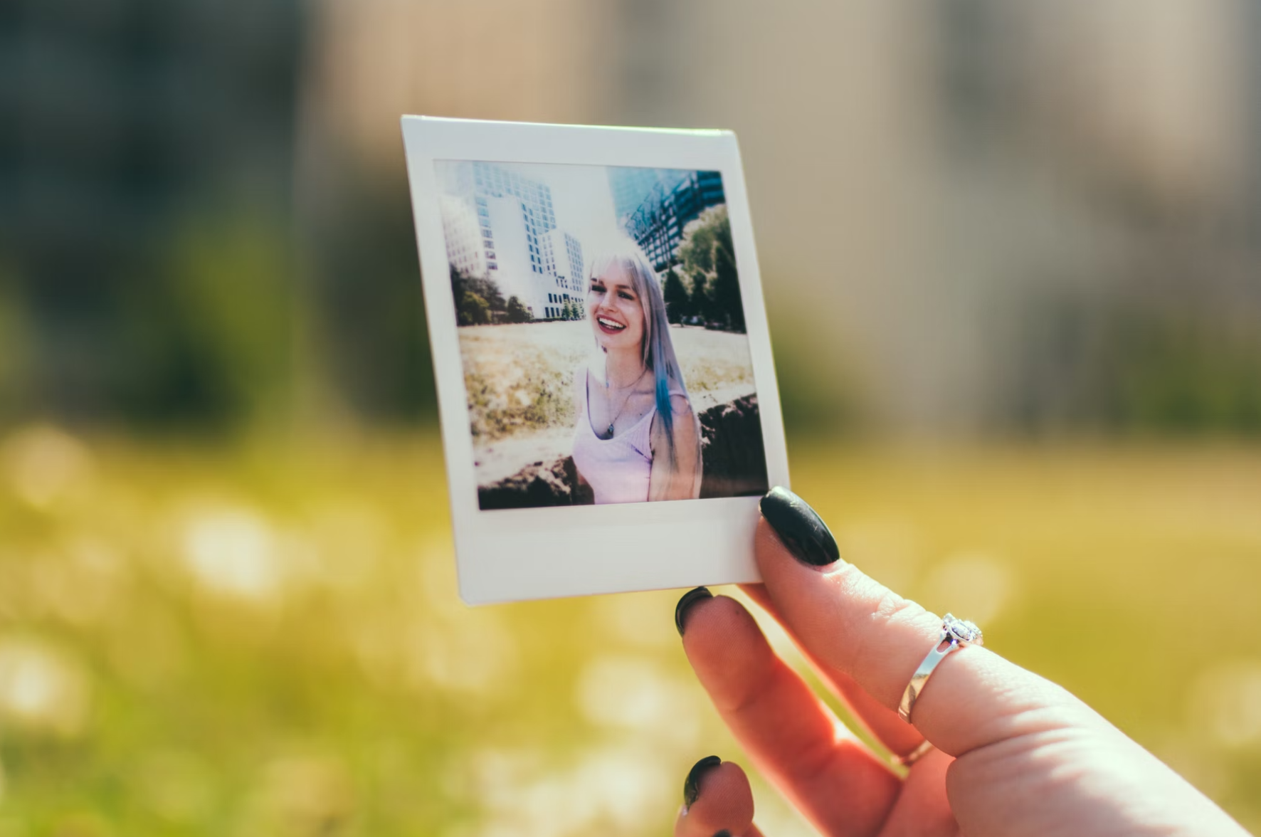 polaroid picture of girl smiling