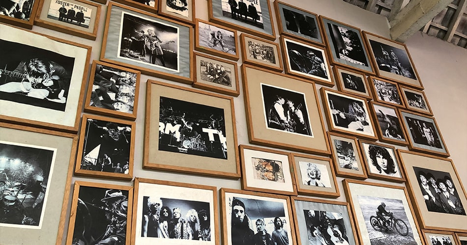 Properly stored vintage photographs in archival sleeves inside climate-controlled environment
