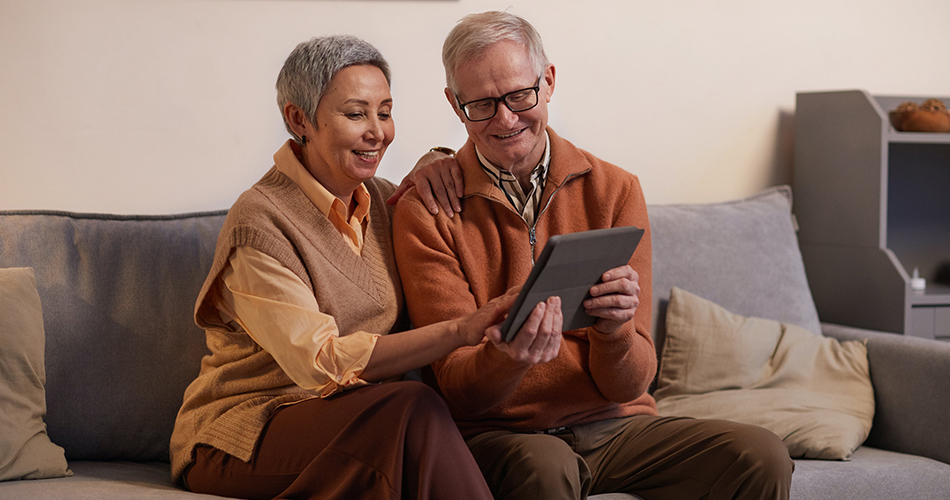 Couple looking at digitized photos