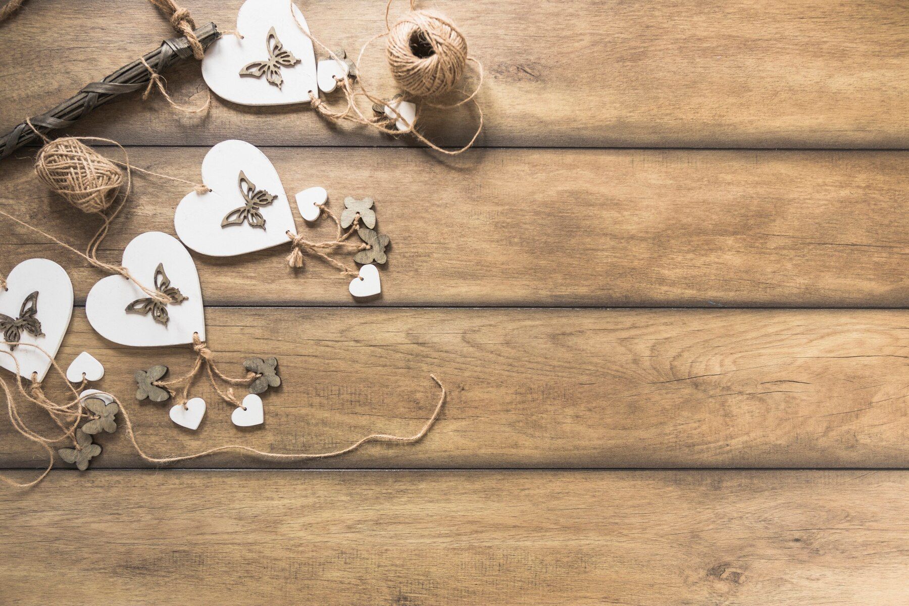 heart-windchimes-wooden-plank-with-spool_23-2147898980.jpg